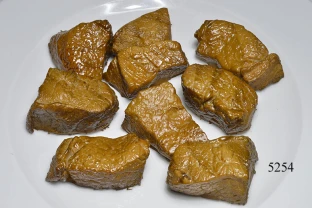 Fleischstücke gebraten (100 gr.) Gulasch